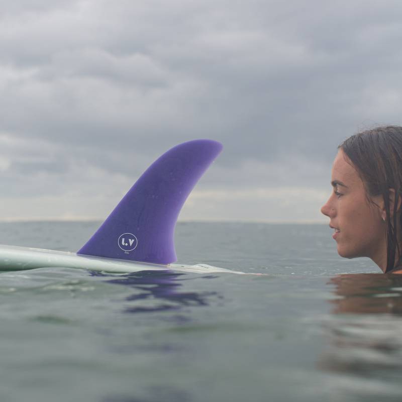 LVFins LB Nose Rider 11" Single Fin - Purple in the water