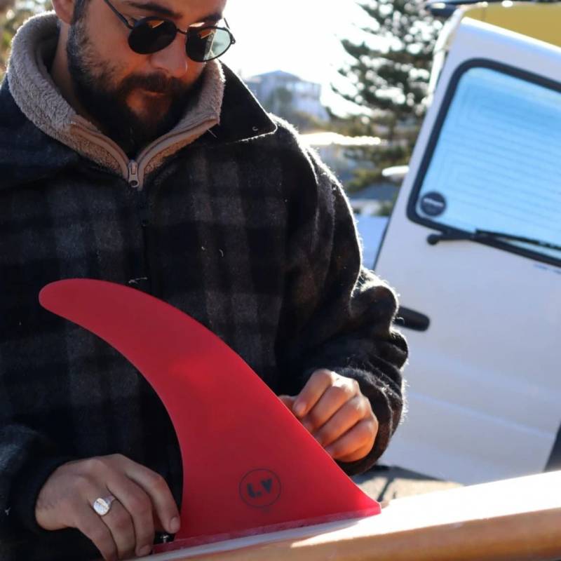 LVfins LB Classic Raked Single Fin - Red installed on longboard surfboard